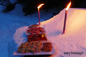 Aperitivo in motoslitta: happy hour coi bambini nei boschi di San Martino di Catrozza